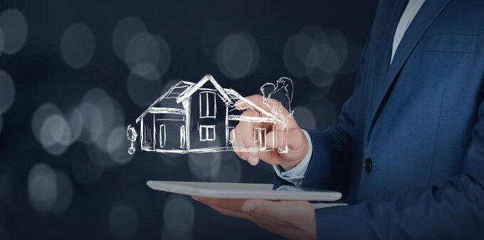 Person using a laptop with an AI hologram